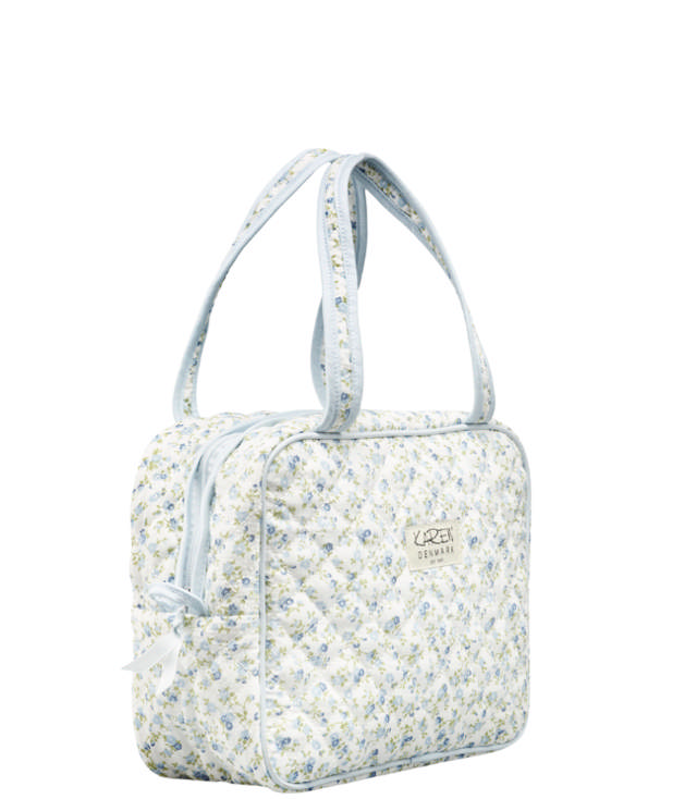Karen stor toilettaske med hank i blåt småblomstret quilt